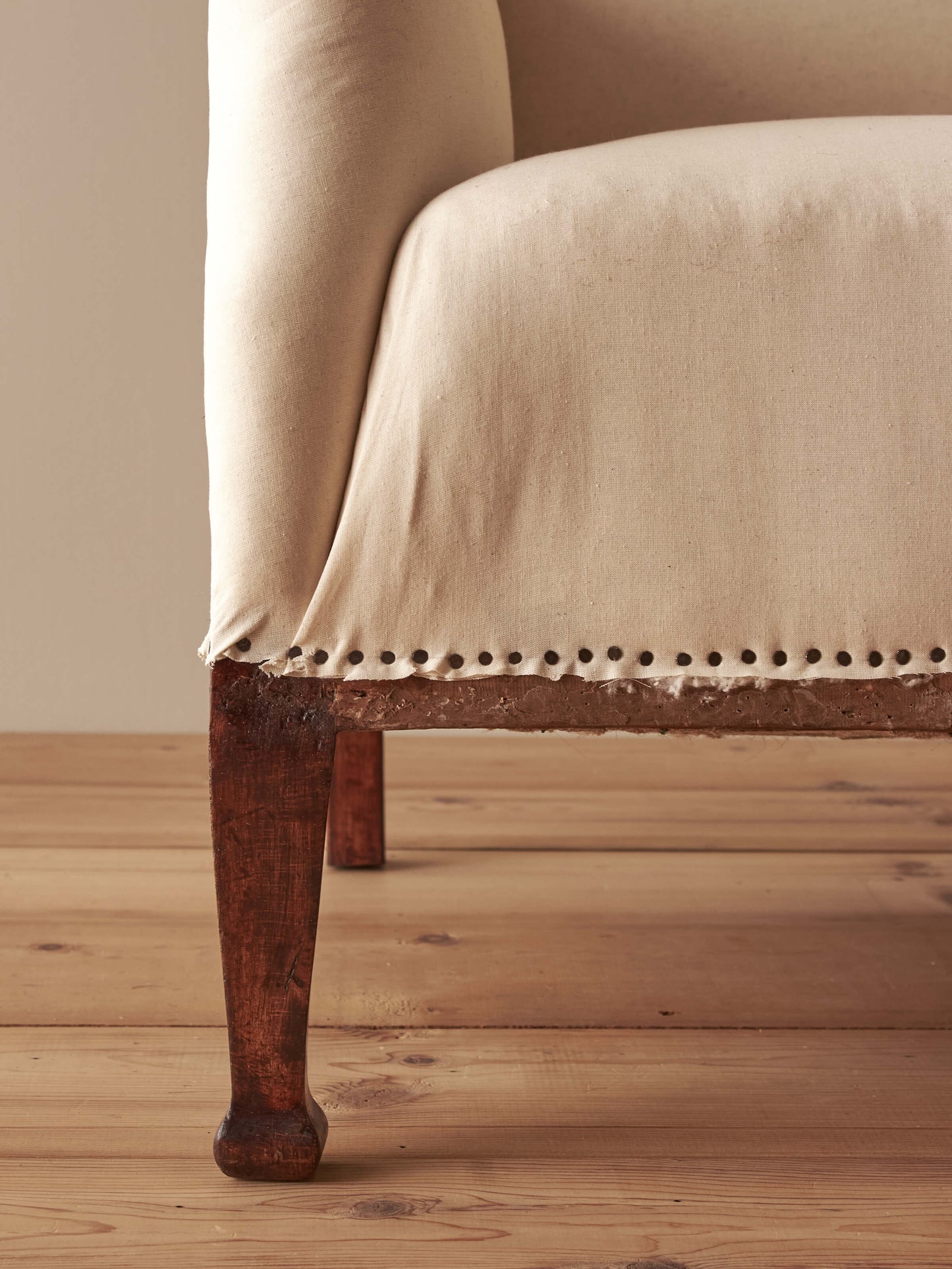 Edwardian upholstered wingback armchair