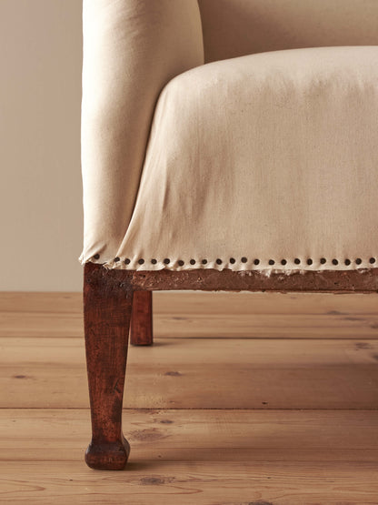 Edwardian upholstered wingback armchair