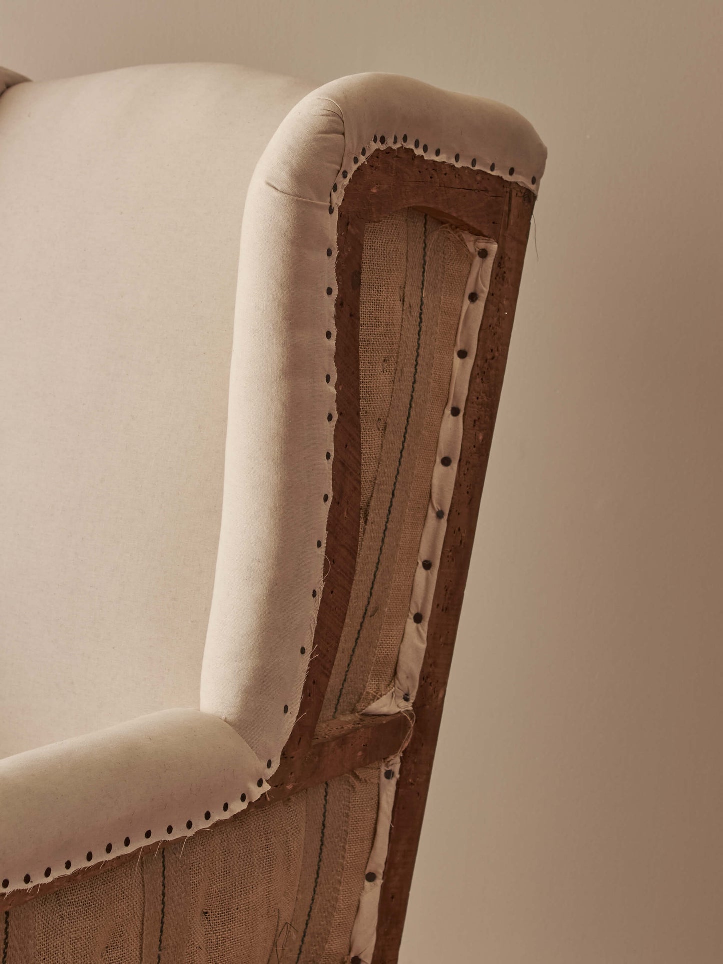 Edwardian upholstered wingback armchair