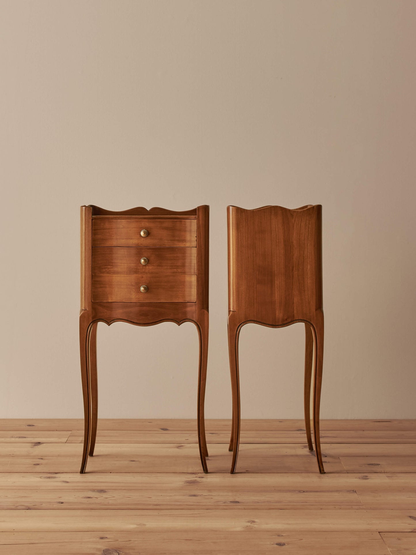 Pair of French cherry bedside tables with three drawers