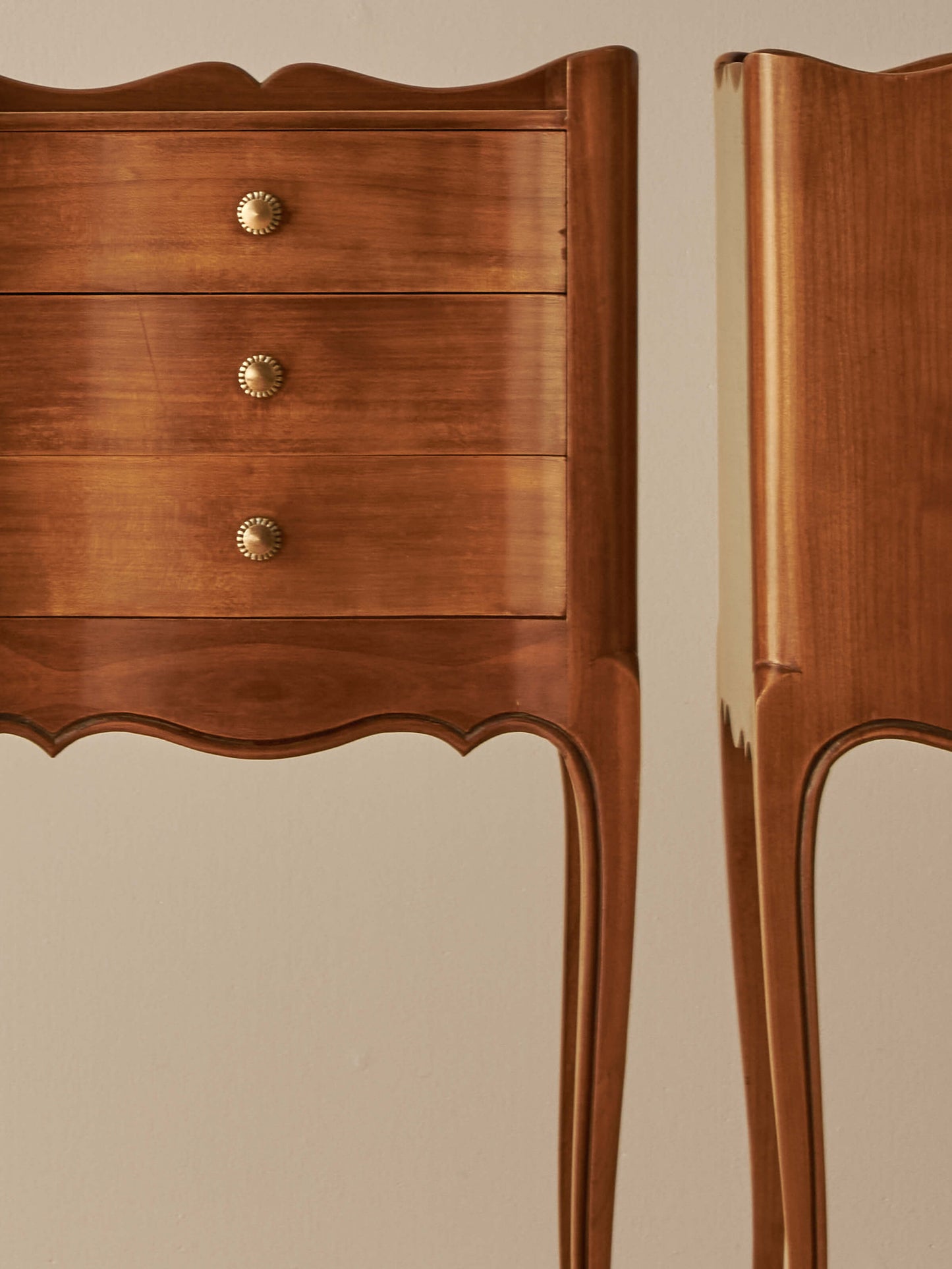 Pair of French cherry bedside tables with three drawers