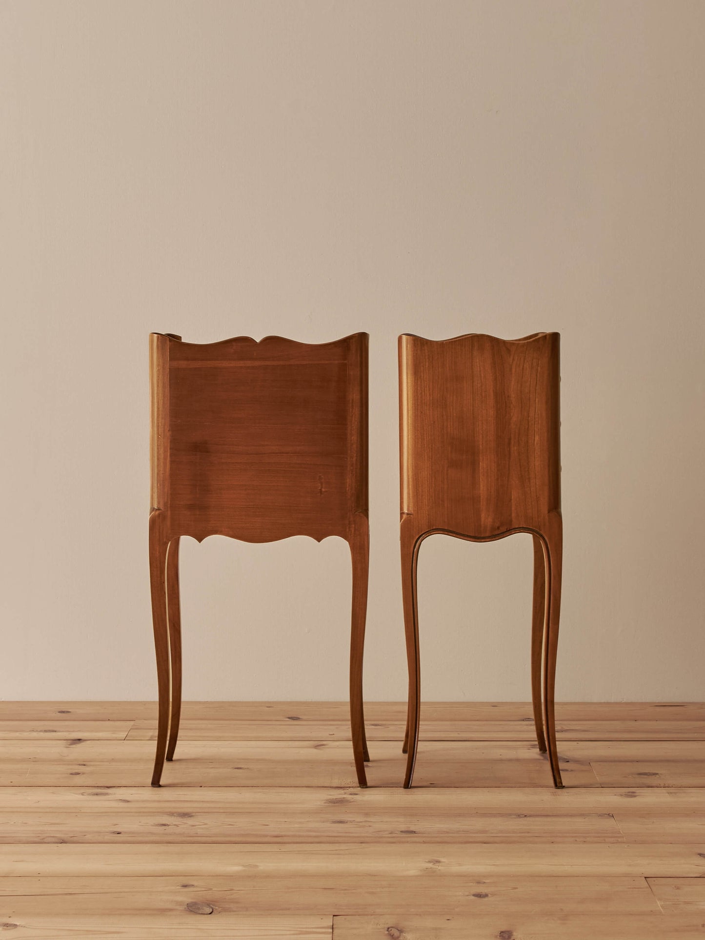 Pair of French cherry bedside tables with three drawers