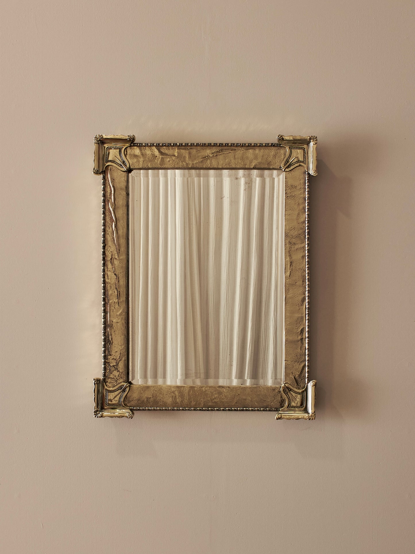 Arts and Crafts brass wall mirror