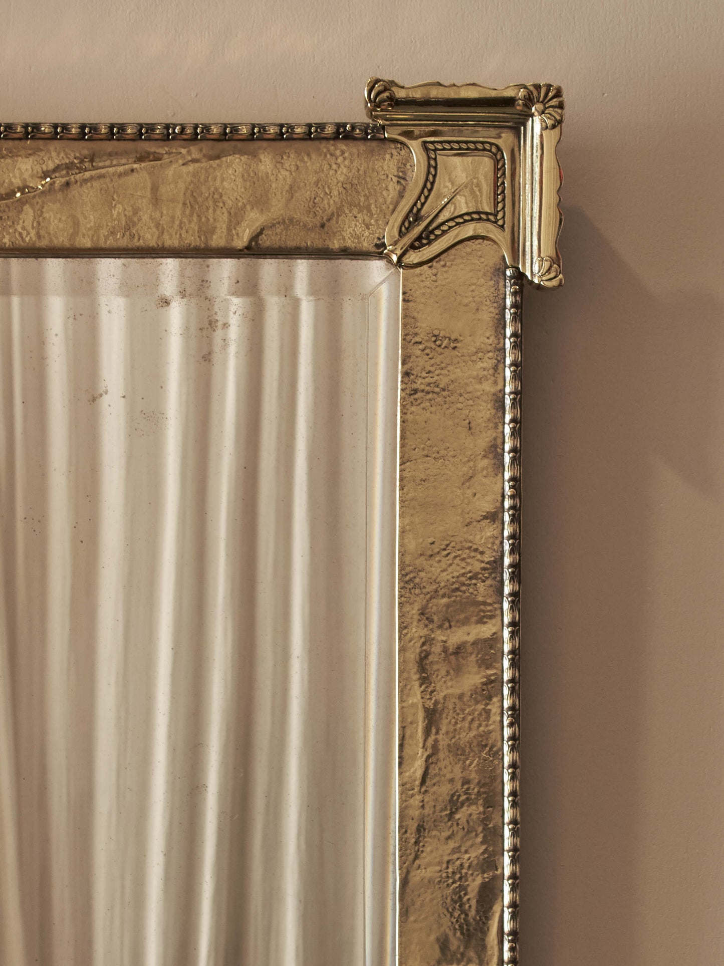 Arts and Crafts brass wall mirror