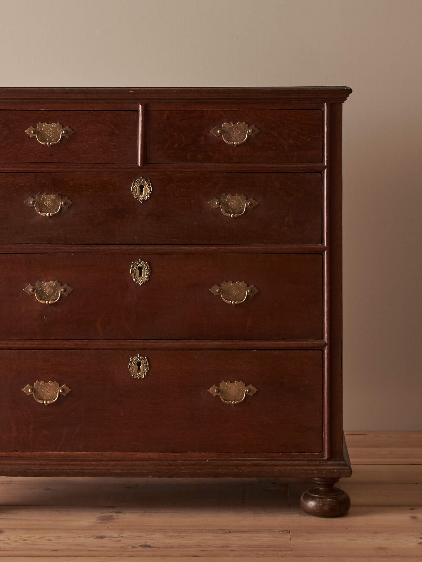 Georgian oak chest of drawers on bun feet