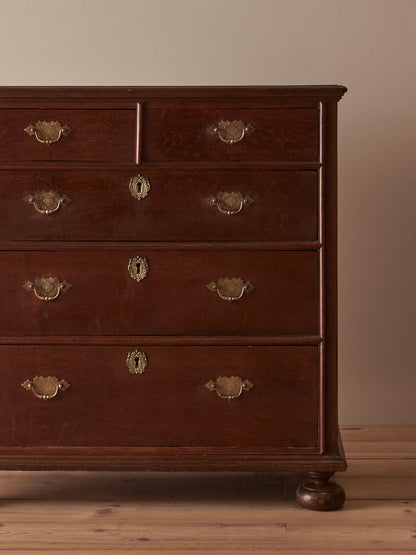 Georgian oak chest of drawers on bun feet