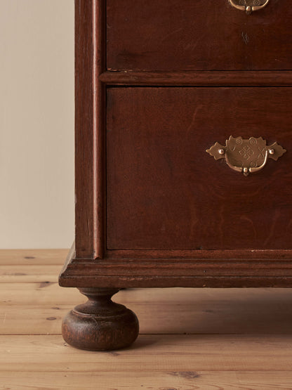 Georgian oak chest of drawers on bun feet