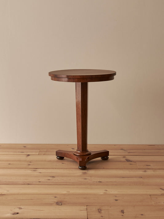 Regency rosewood pedestal table on bun feet