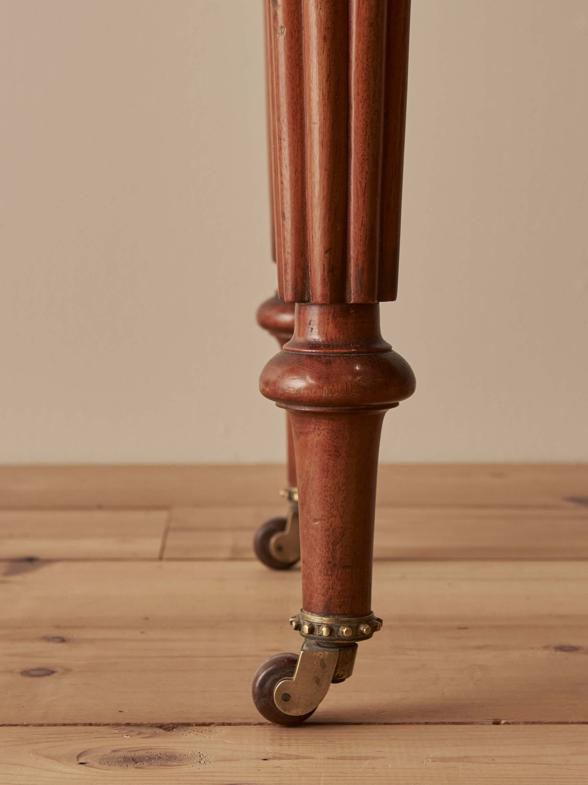 Victorian mahogany writing table with reeded legs