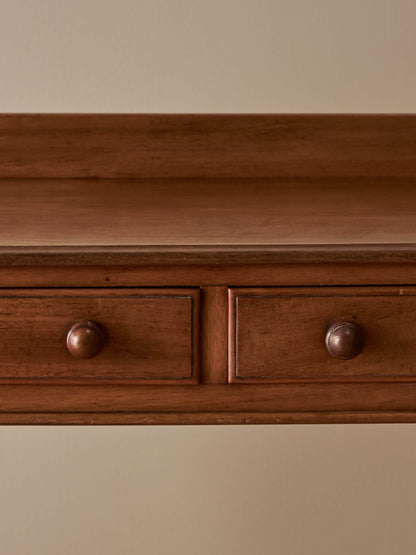 Victorian mahogany writing table with reeded legs