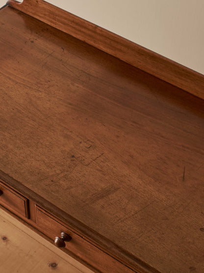 Victorian mahogany writing table with reeded legs