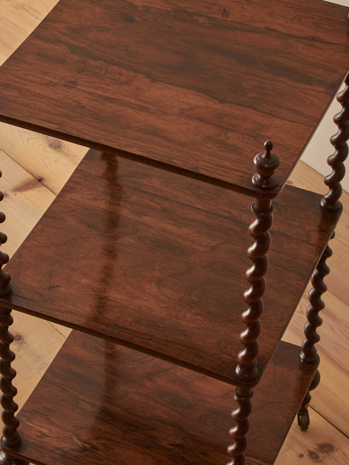 Regency rosewood whatnot on castors