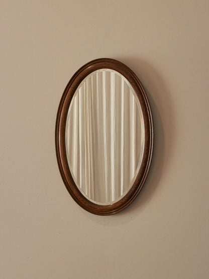 Antique oval oak bevelled mirror