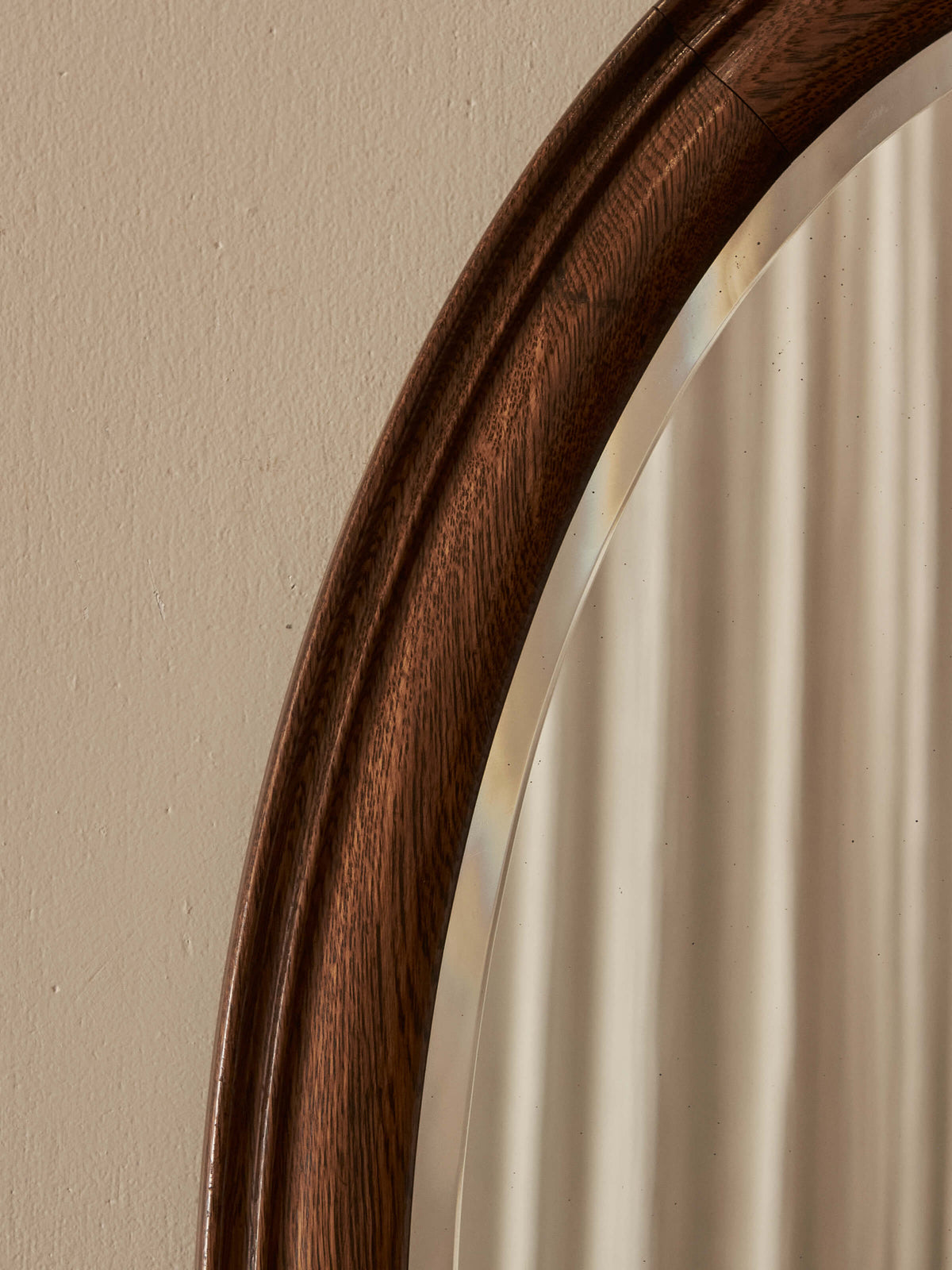 Antique oval oak bevelled mirror