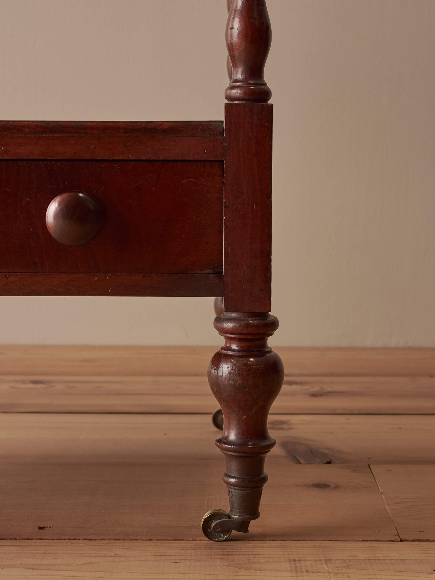 Victorian mahogany bobbin whatnot on castors
