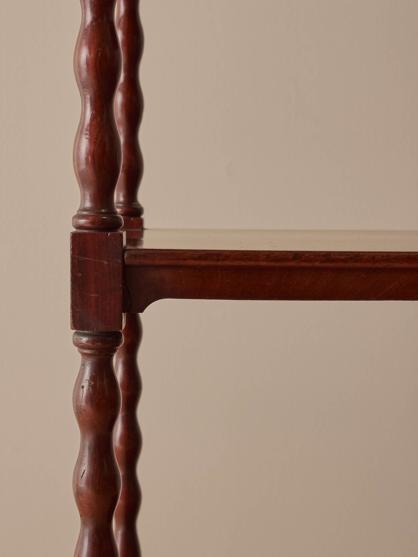 Victorian mahogany bobbin whatnot on castors