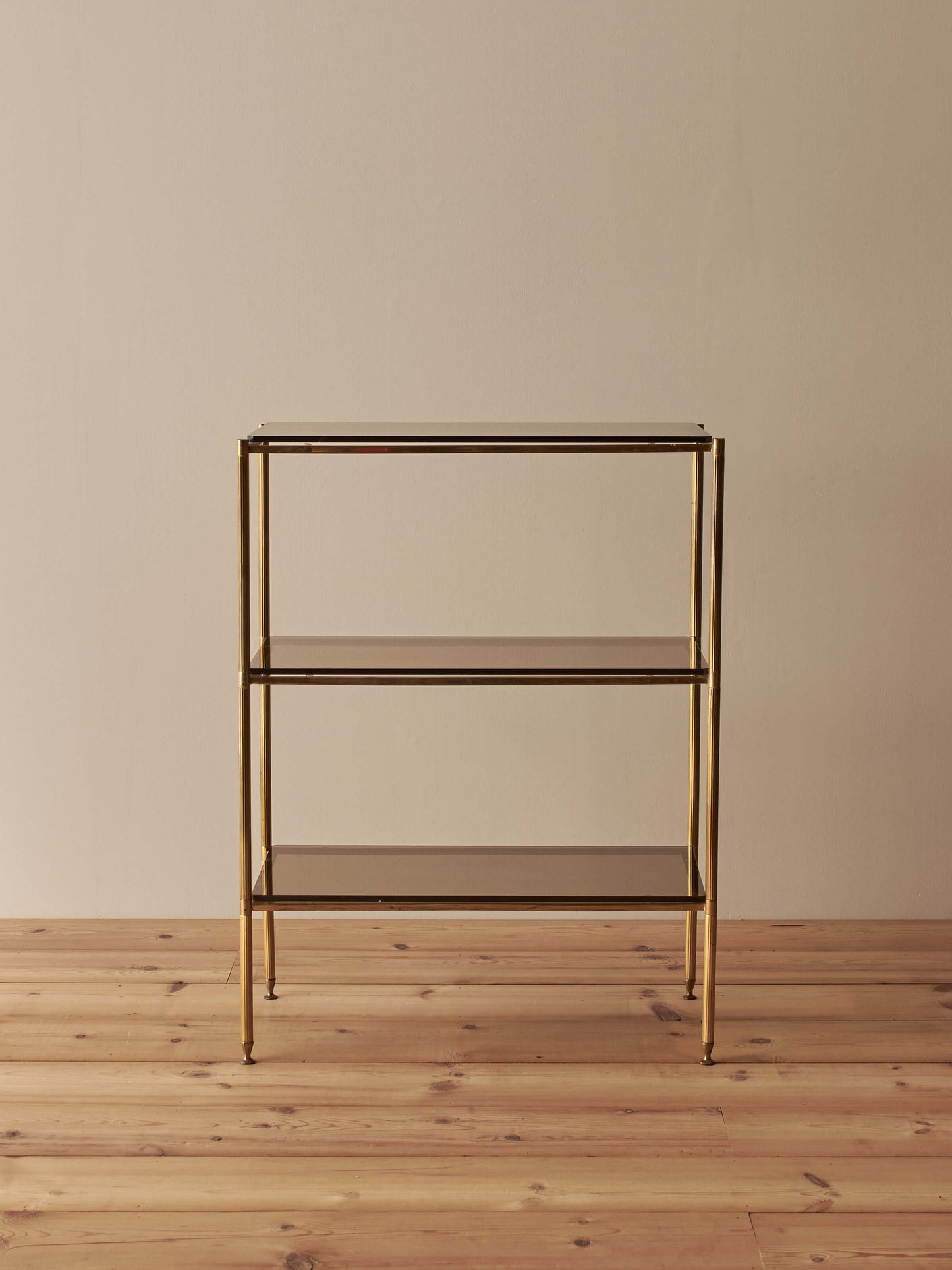Mid-century brass and smoked glass shelving unit