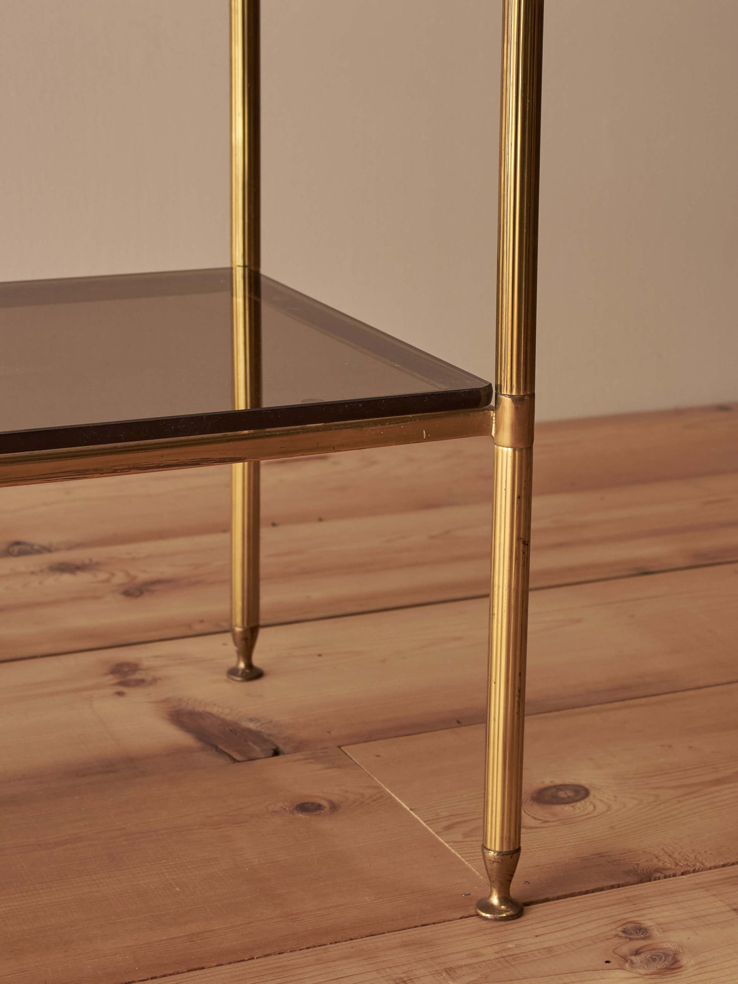 Mid-century brass and smoked glass shelving unit