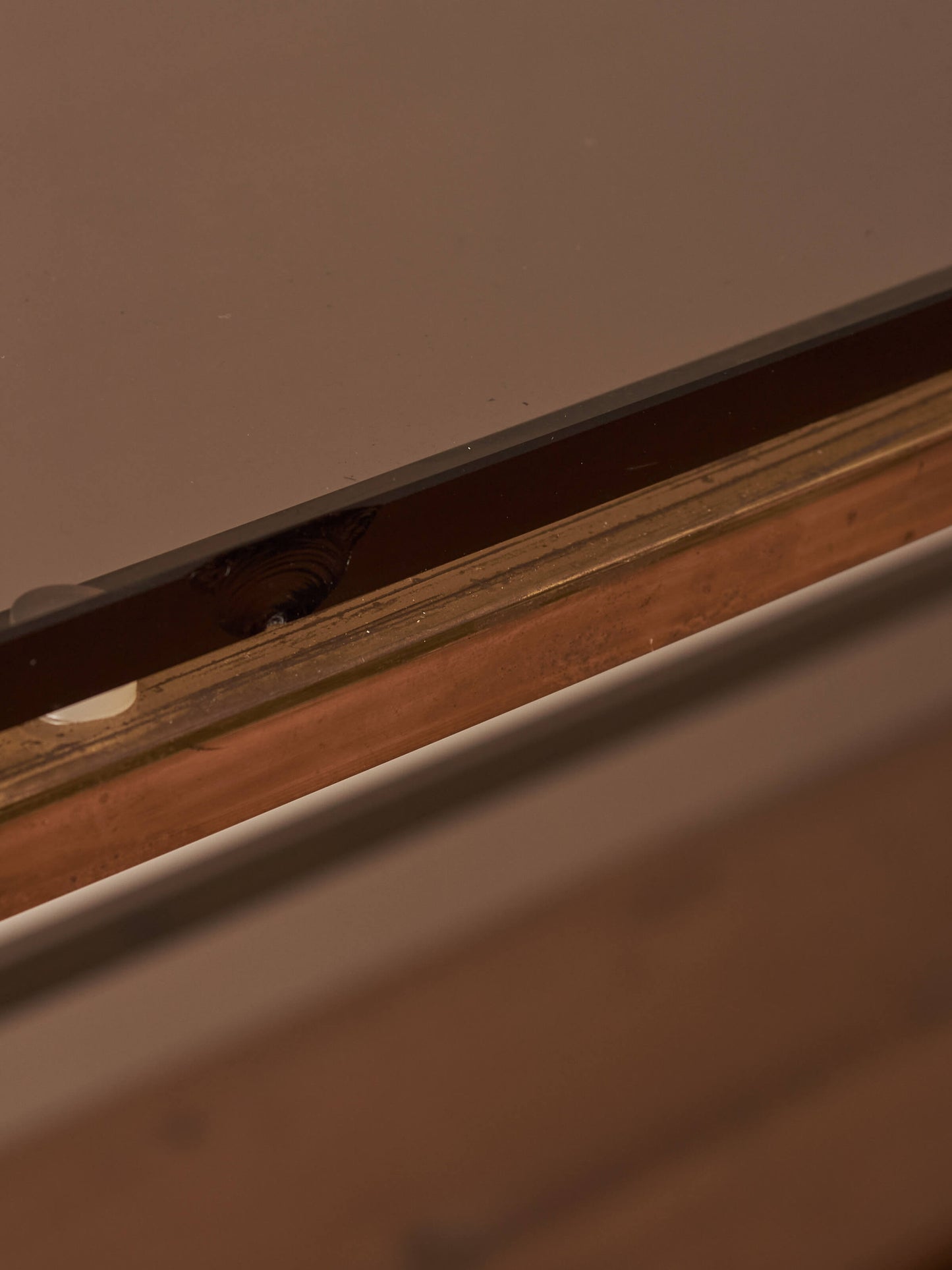 Mid-century brass and smoked glass shelving unit