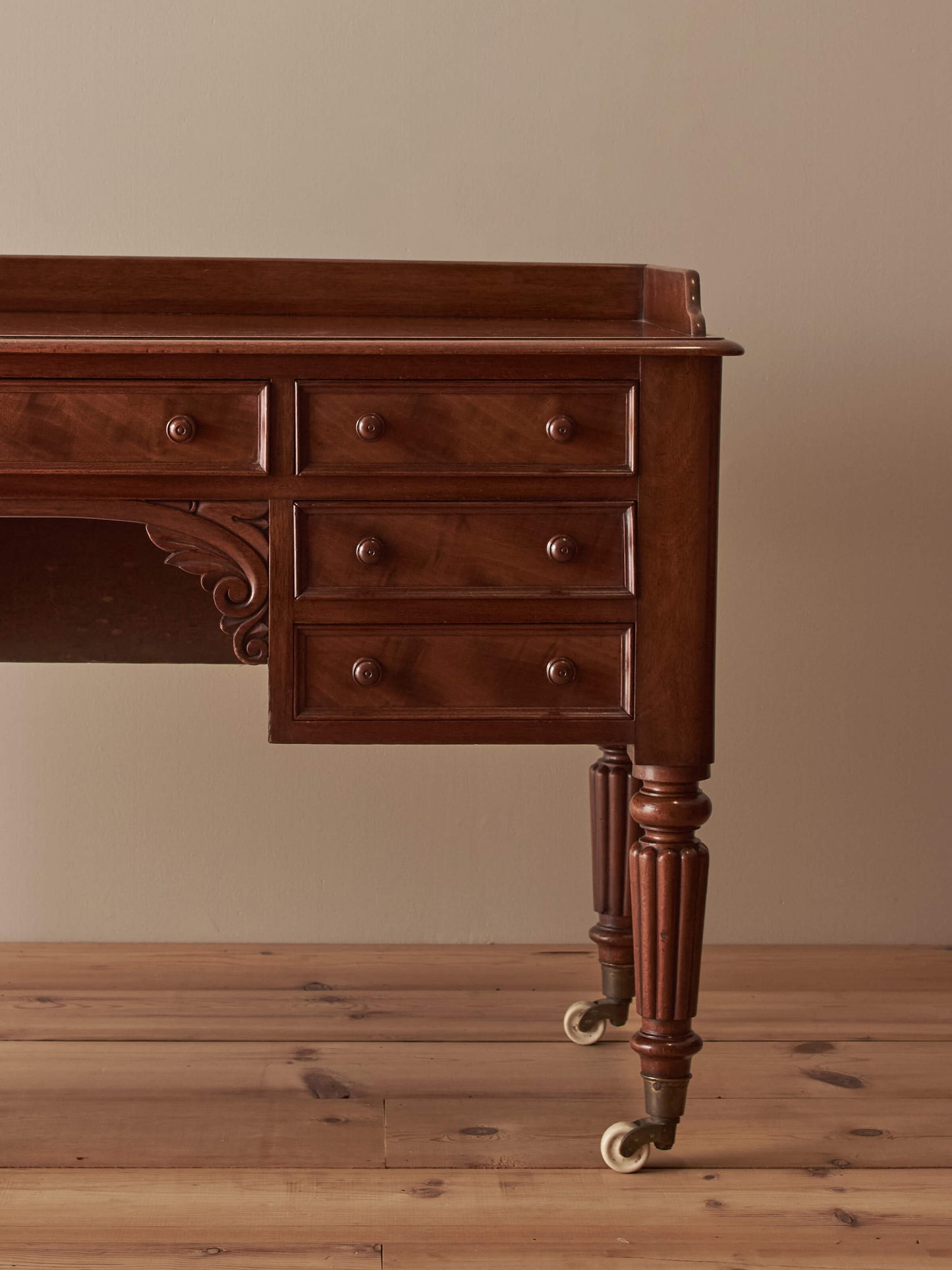 Victorian mahogany desk on castors by T.H.Filmer