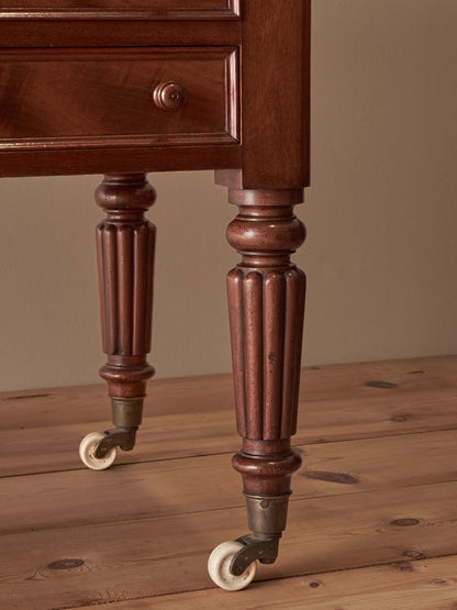 Victorian mahogany desk on castors by T.H.Filmer