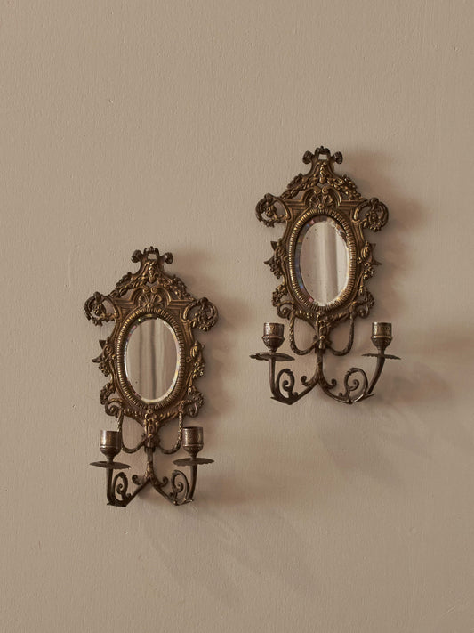Pair of French antique mirrored brass candle sconces