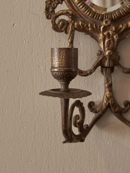 Pair of French antique mirrored brass candle sconces