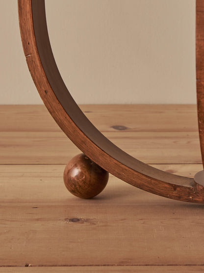 Art Deco walnut circular side table on ball feet