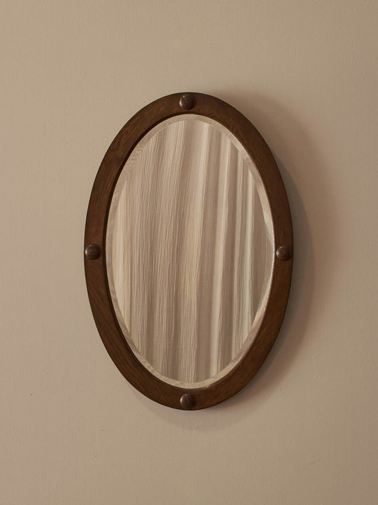 Edwardian oval oak mirror