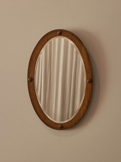 Edwardian oval oak mirror
