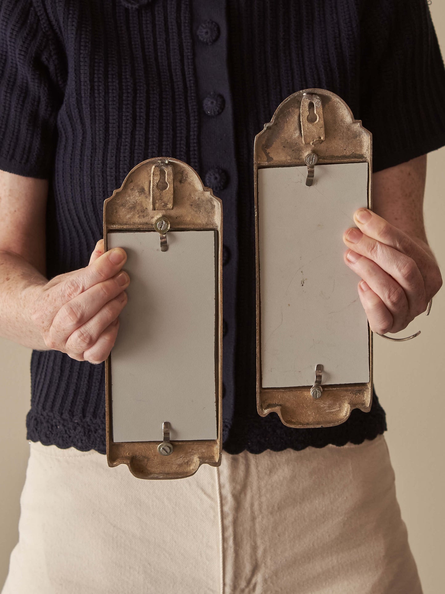 Mid-century Swedish mirrored brass candle sconces