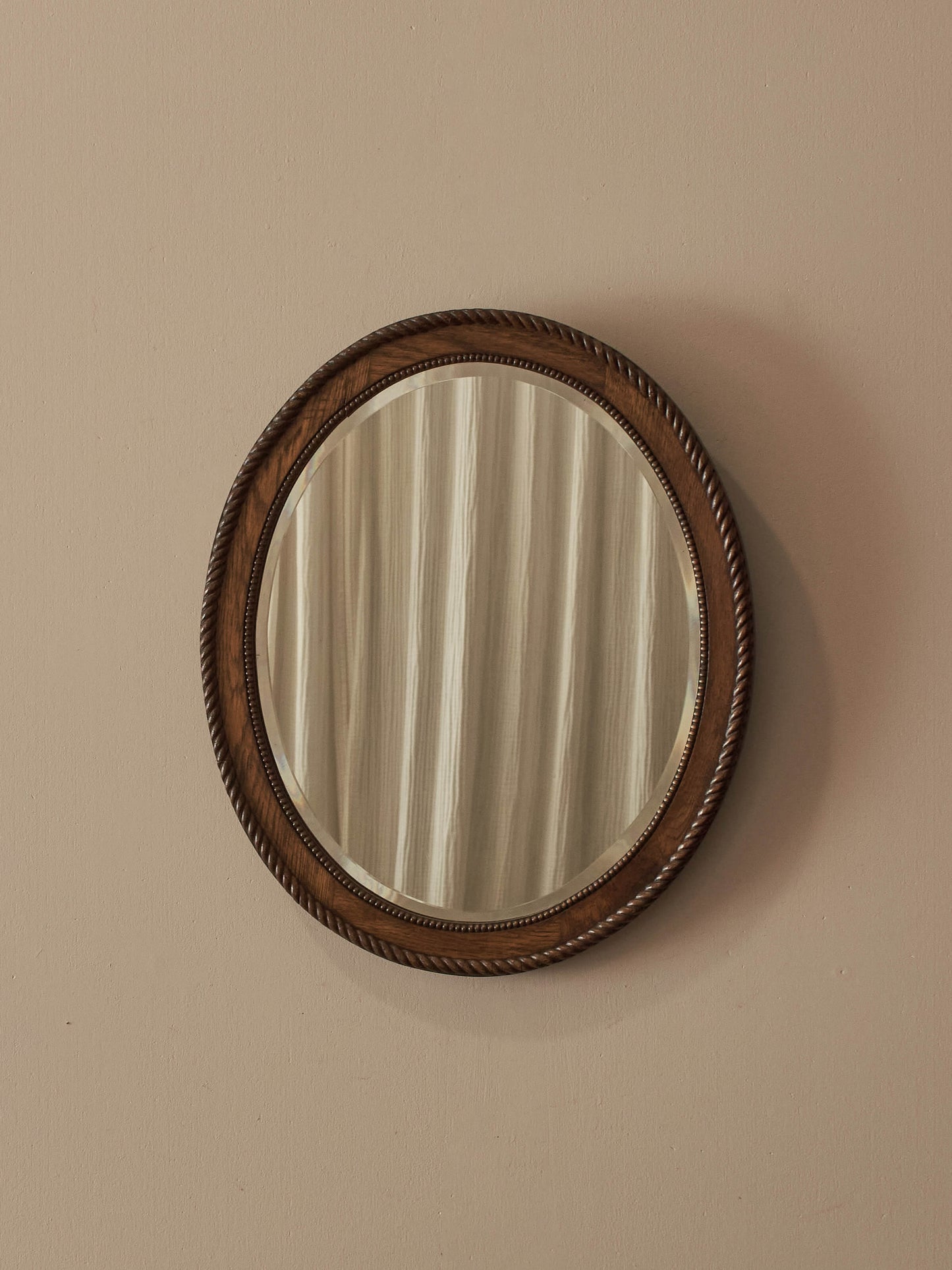 Antique oval oak rope-twist mirror