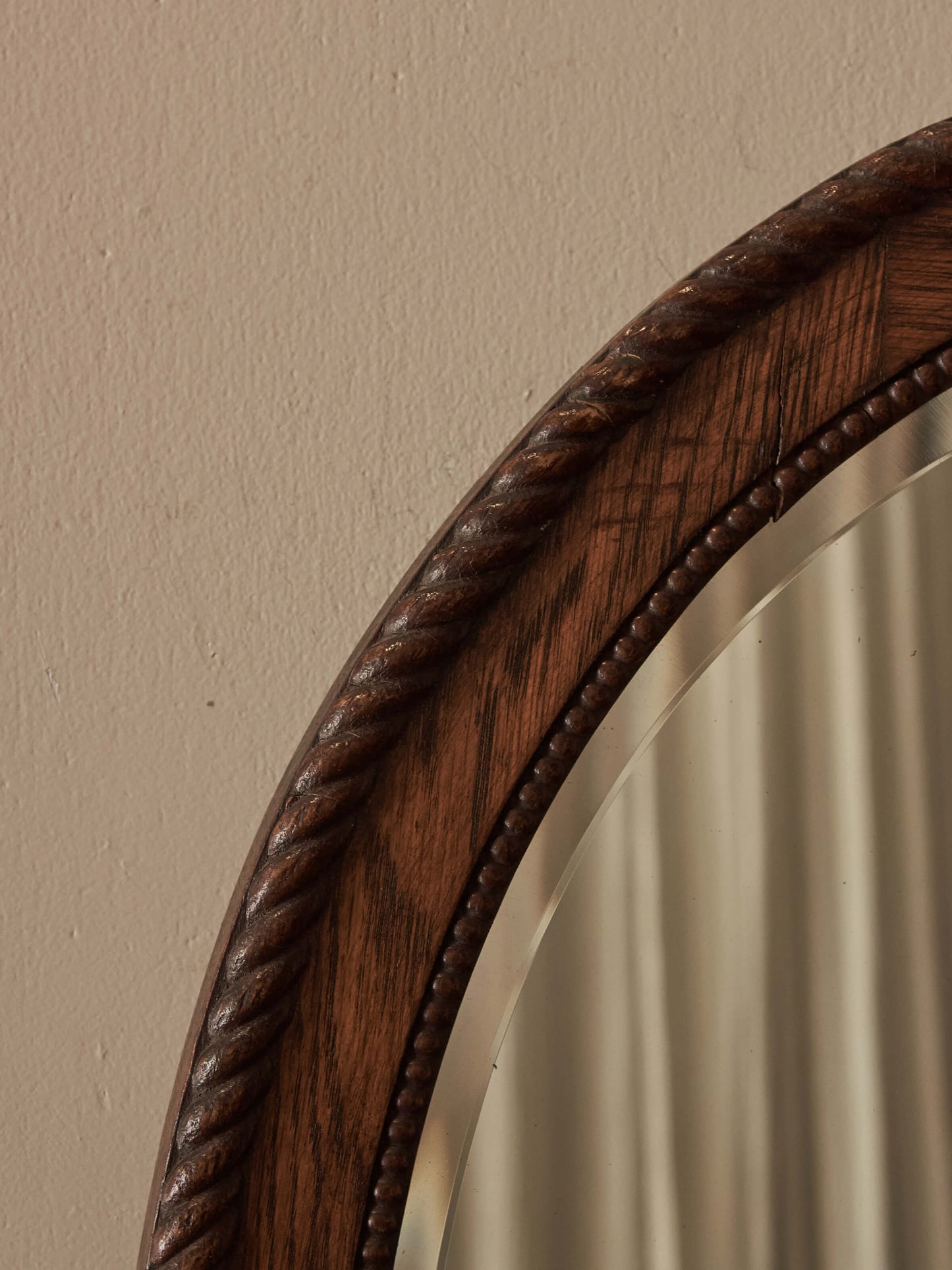 Antique oval oak rope-twist mirror