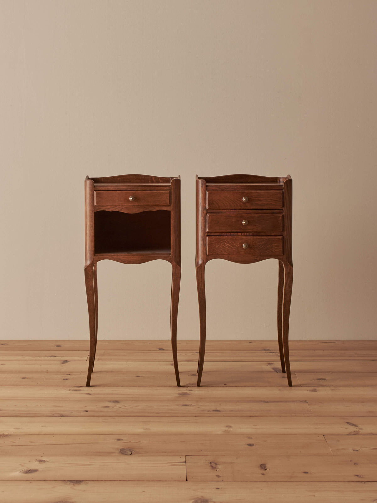 Close-pair of vintage French oak bedside tables