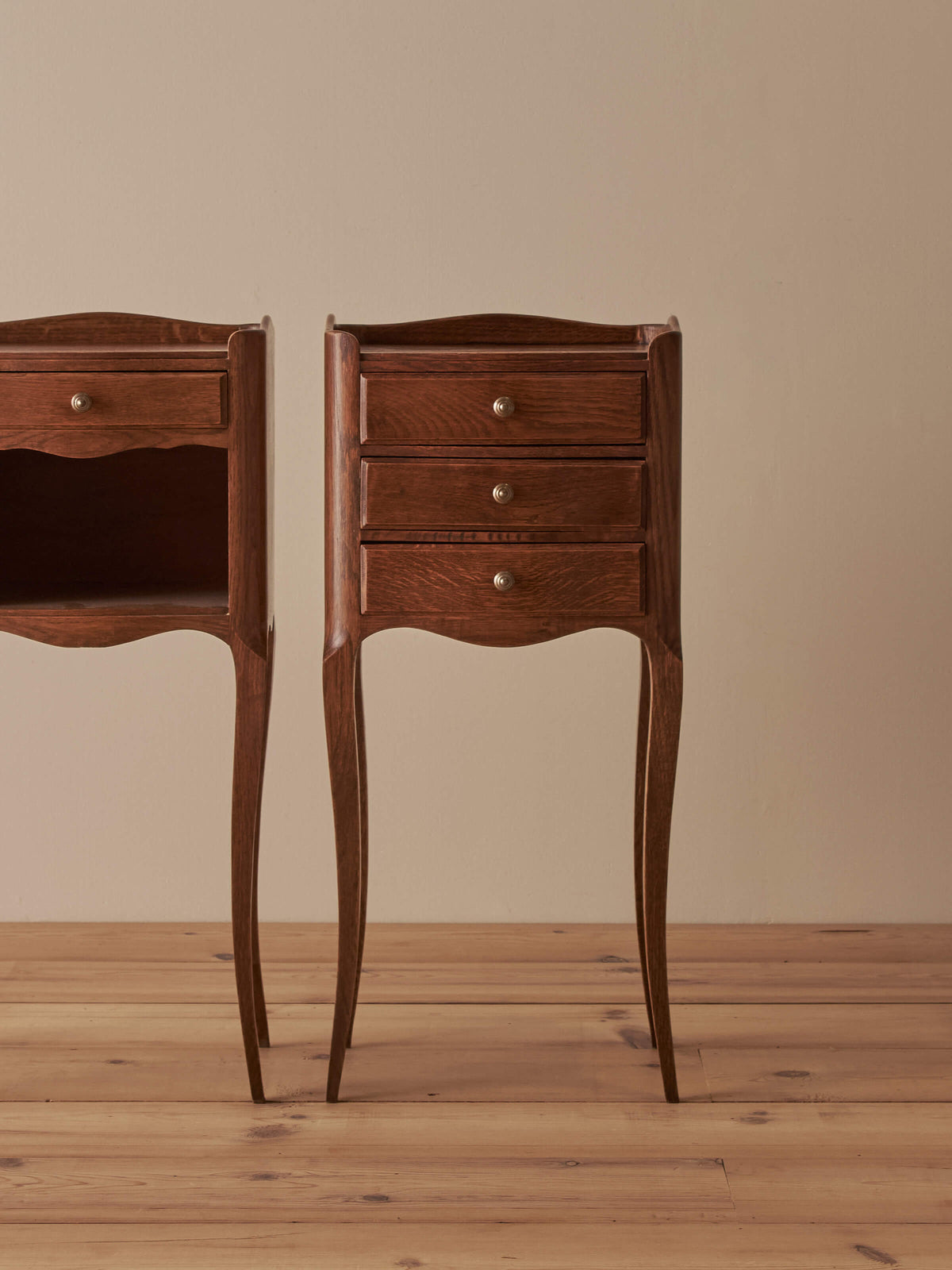 Close-pair of vintage French oak bedside tables