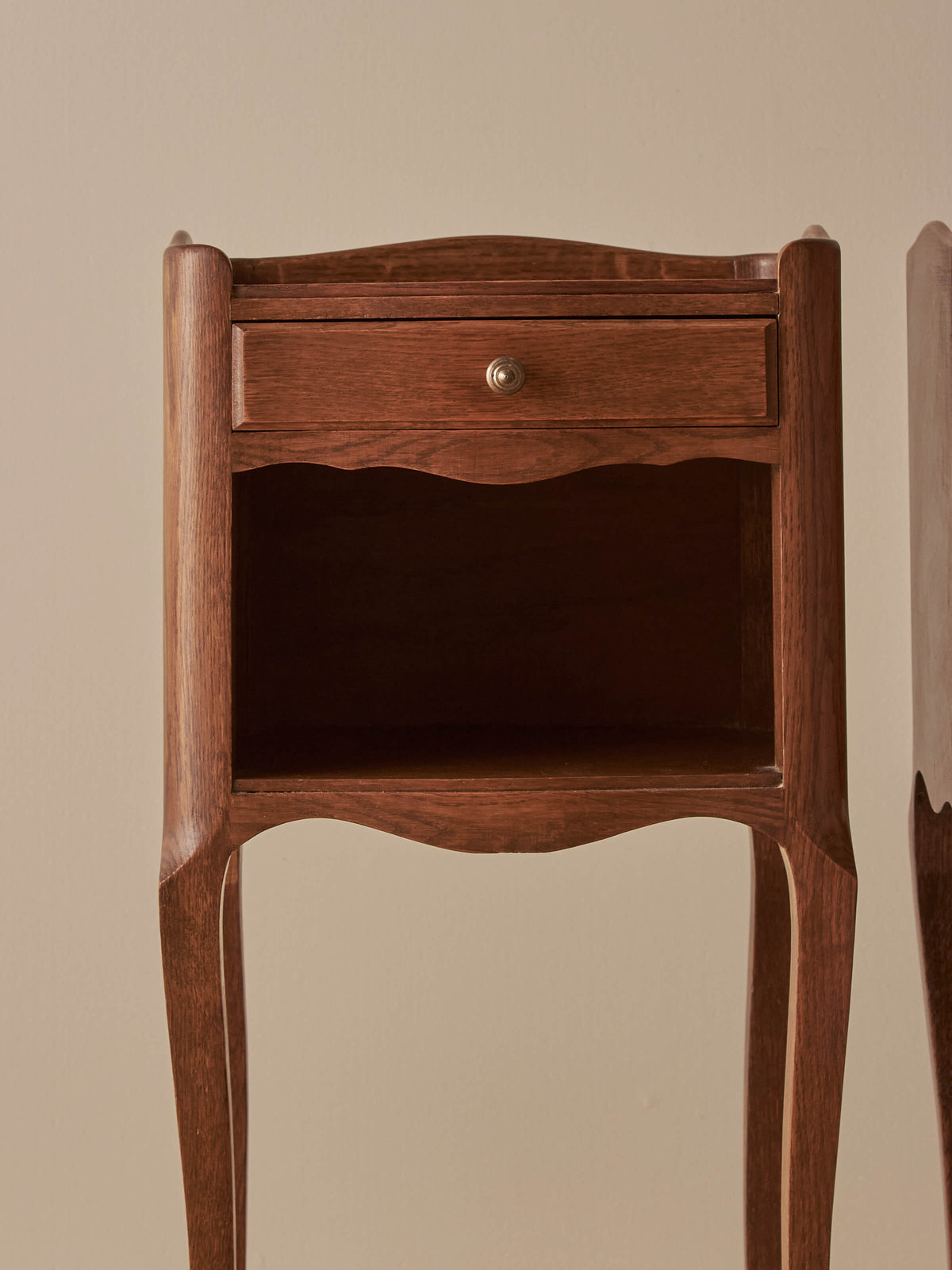 Close-pair of vintage French oak bedside tables