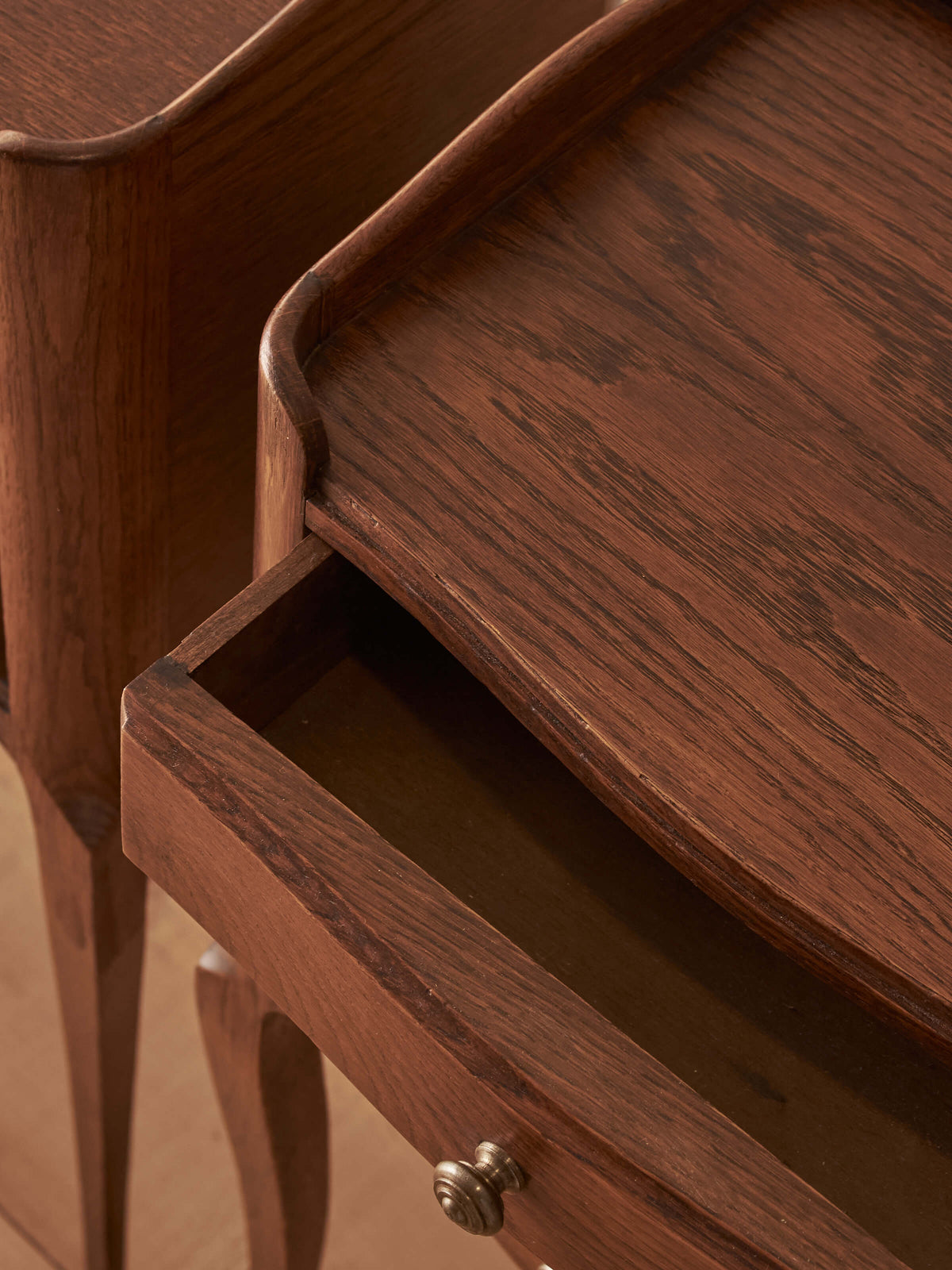 Close-pair of vintage French oak bedside tables
