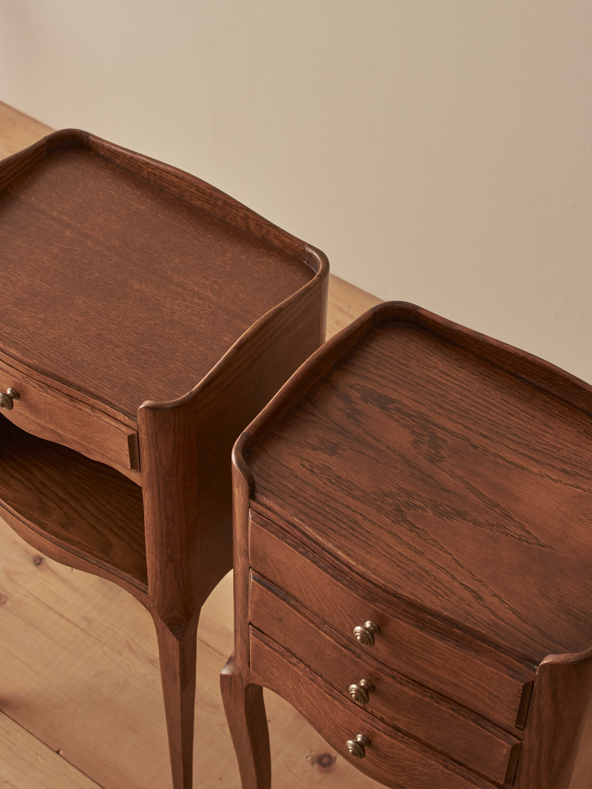 Close-pair of vintage French oak bedside tables