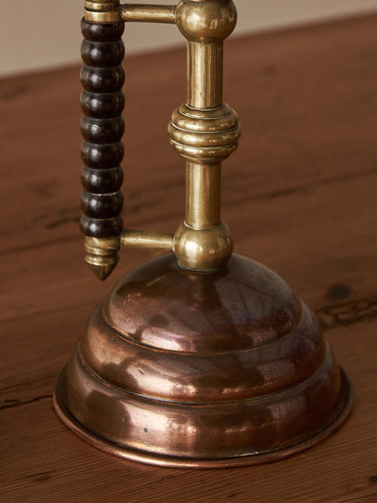 A pair of Arts and Crafts candlesticks by Christopher Dresser