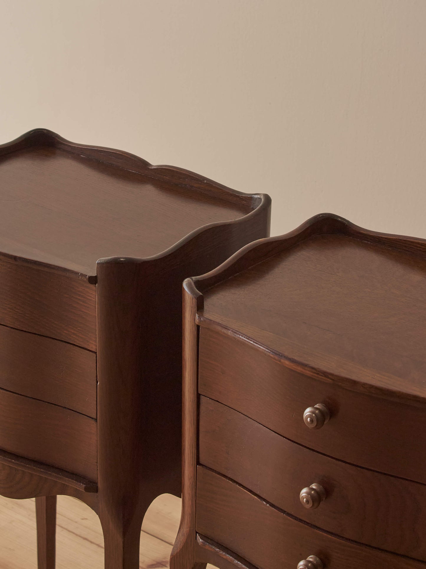 Pair of French mid-century bedside tables with three drawers