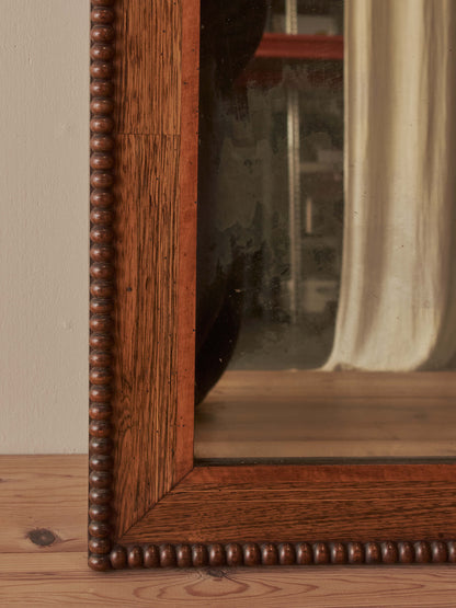 Large antique rosewood bobbin mirror