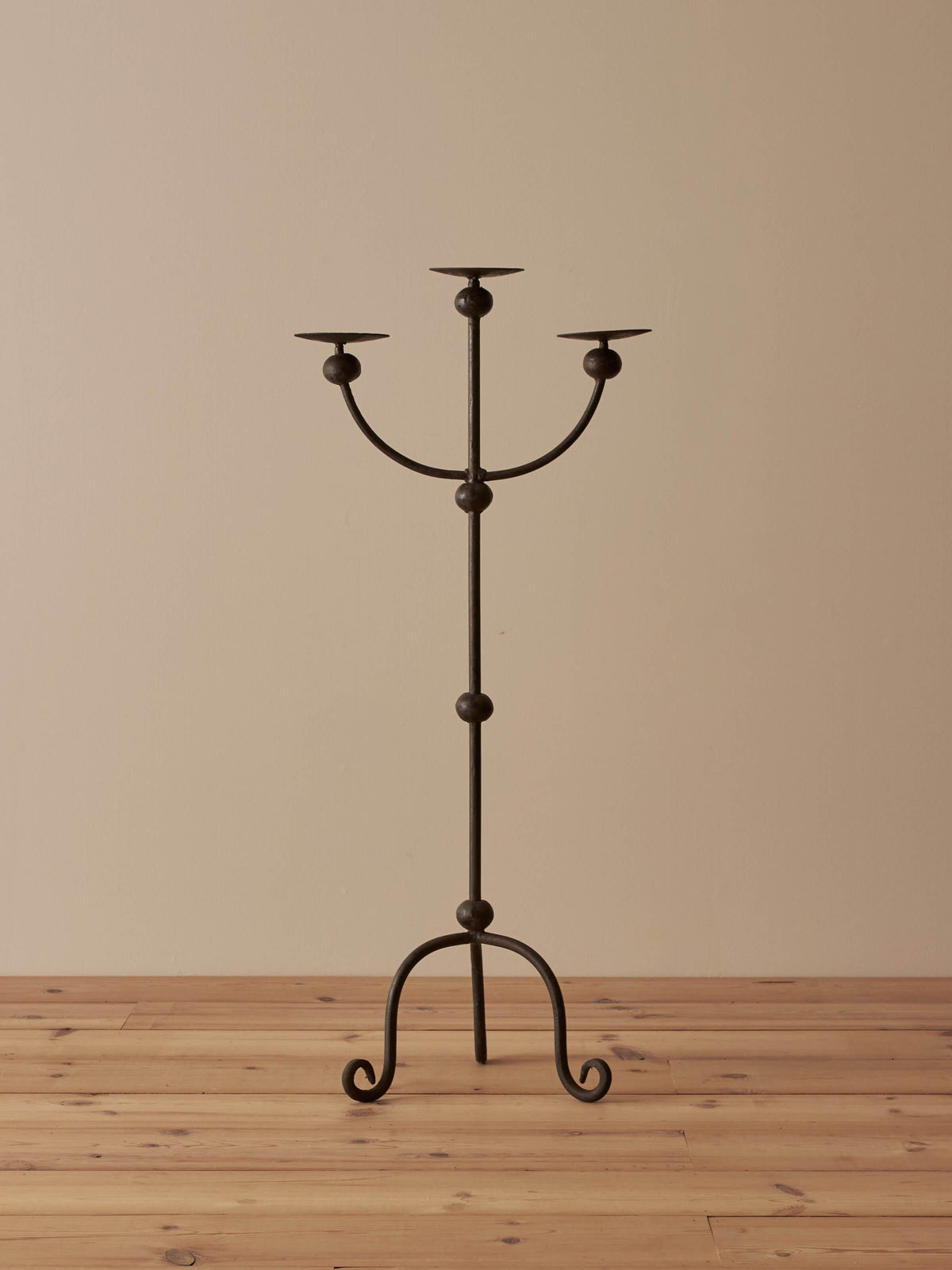 Antique wrought iron floor-standing candelabra