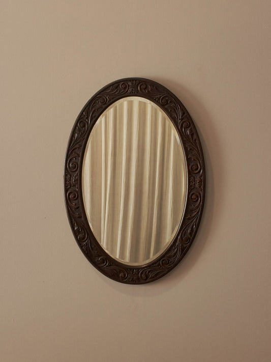 Late Victorian carved oak decorative mirror