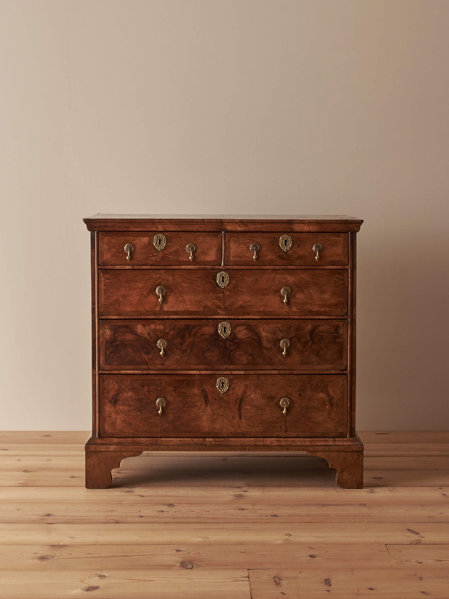Georgian walnut feather-banded chest of drawers