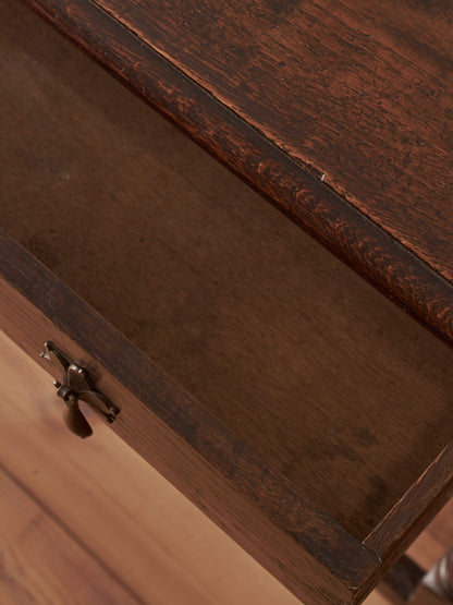 Early 18th century side table with scalloped apron