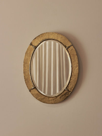 Arts and Crafts oval hammered brass mirror
