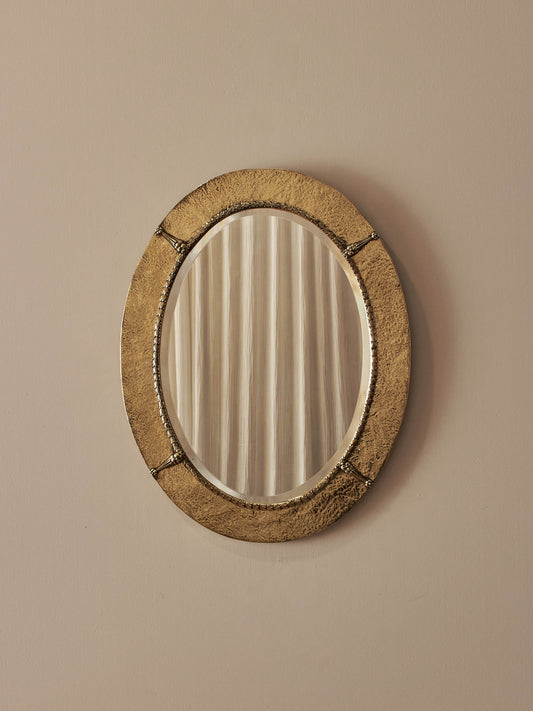 Arts and Crafts oval hammered brass mirror