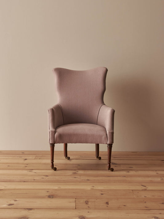 Victorian armchair raised on castors