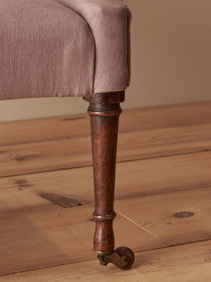Victorian armchair raised on castors