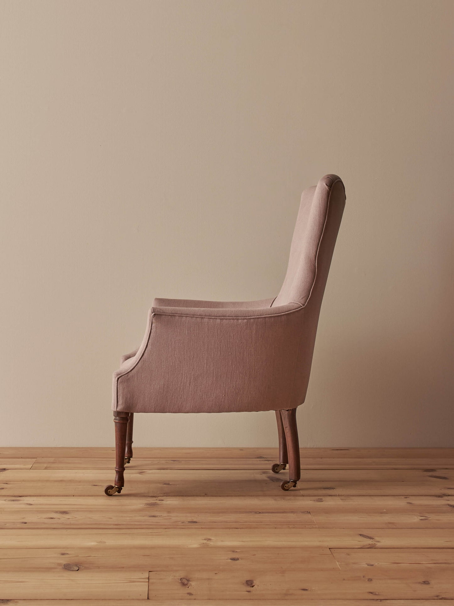 Victorian armchair raised on castors